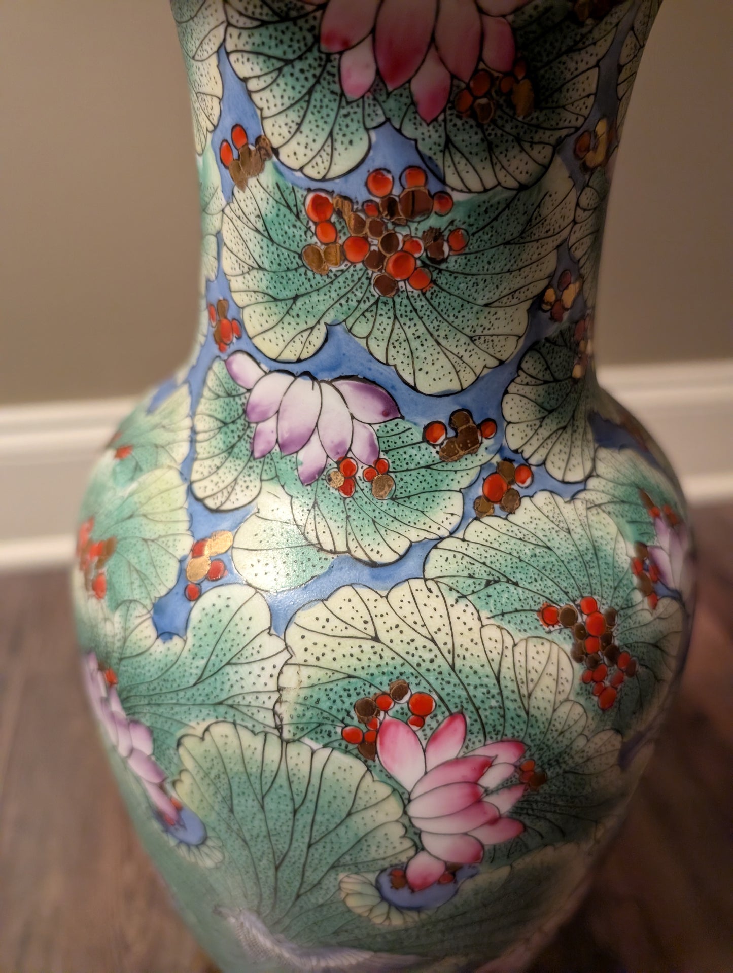Decorative vase with floral patterns on a neutral background